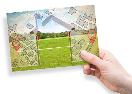 Land plot management - Imaginary city map with buildings, land parcels and home silhouette - real...