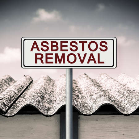 Asbestos removal written on a placard - concept imageの写真素材