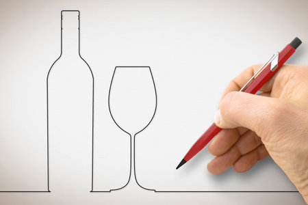 Hand drawing a bottle of wine with a wineglass - concept image with a single line design.の写真素材