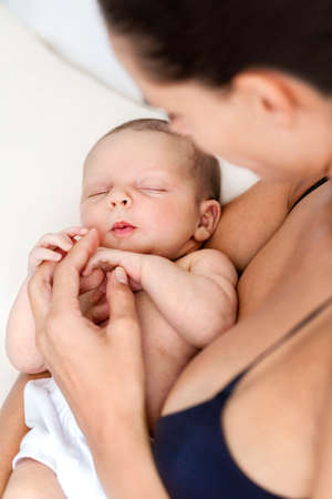 Mother and her newborn baby boyの写真素材