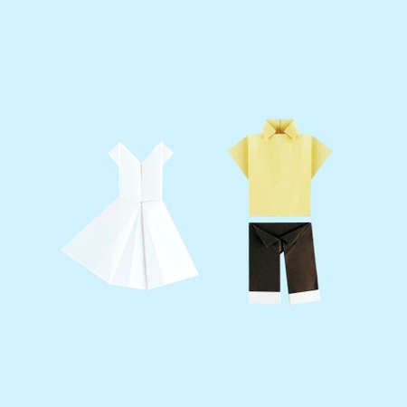 Origami woman and man paper dresses on blue backgroundの写真素材
