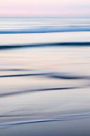 Vivid lights of the sea sunset with long exposure effectの写真素材