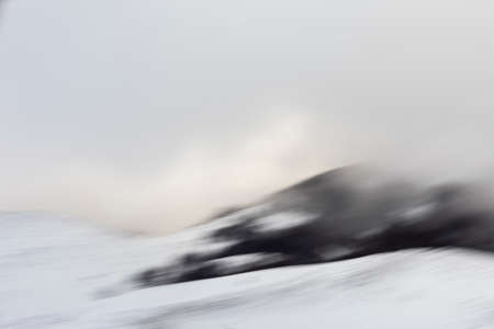 Motion blurred of mountains with the snowの写真素材