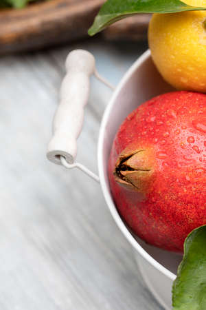 Fruits on plate. Wooden surfaceの写真素材