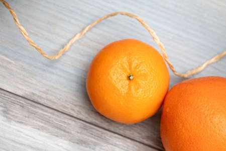 orange fruits on a wodden tableの写真素材