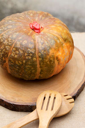 pumpkin on a table. wooden setの写真素材
