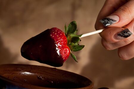 Strawberries with melted choccolateの写真素材