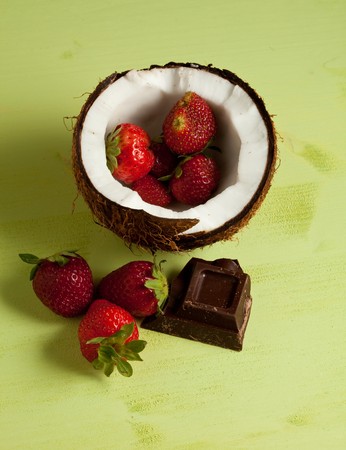 coconut with strawberries and choccolateの写真素材