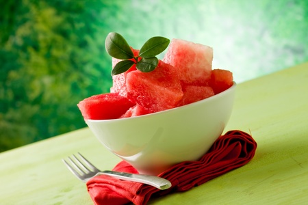 photo of delicious cutted watermelon inside a bowlの写真素材