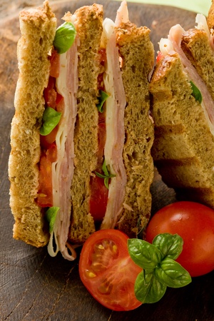  delicious sandwich with cheese and ham on wooden tableの写真素材