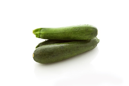 photo of fresh zucchini on white isolated backgroundの写真素材