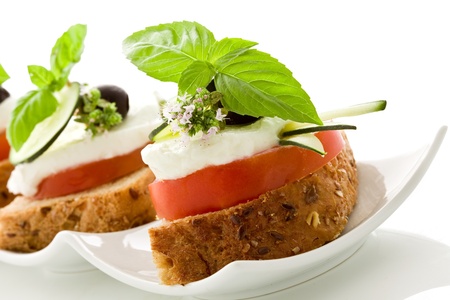  delicious tomato mozzarella starter isolated white backgroundの写真素材
