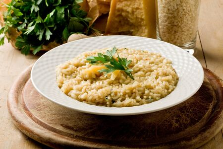 photo of delicious risotto dish with grana parmesan cheeseの写真素材