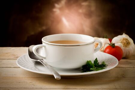 photo of delicious hot noodles soup on wooden tableの写真素材