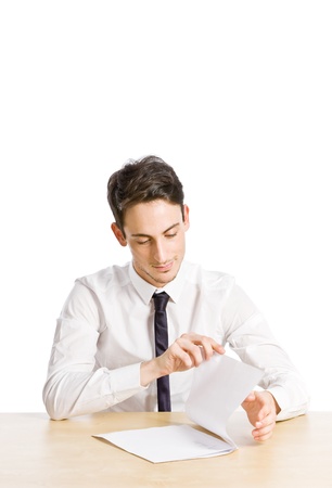 conceptual photo of business man controlling a cv on white backgroundの写真素材