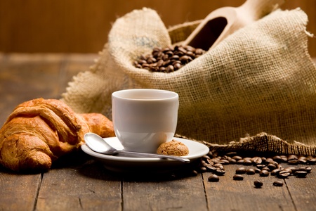 Photo of delicious hot espresso coffee on wooden tableの写真素材