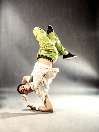 image of acrobatic movements performed by a dancerの写真素材