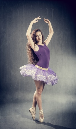 Photo of sexy brunette ballerina in retro style の写真素材