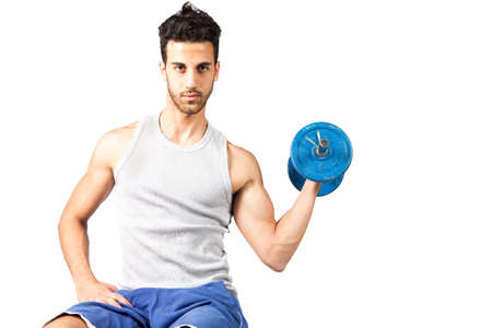 photo of man who is doing fitness exercicesの写真素材