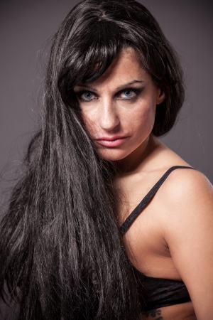 Photo of Sexy Brunette with long black hairs wearing lingerieの写真素材