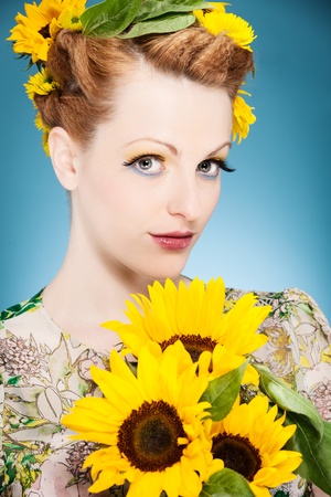 fresh summer makeup with sunflowers in the headの写真素材