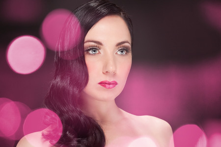 Portrait of brunette woman with 50s makeupの写真素材