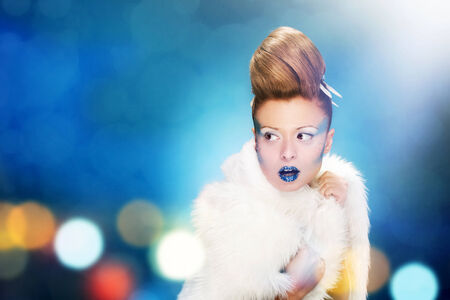 Photo of woman with winter makeup and hairstyleの写真素材