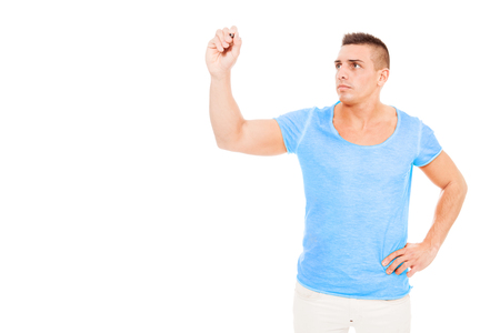 Bodybuilder with pen in his hands over white isolated backgroundの写真素材