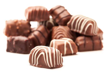 Photo of chocolate pralines over white isolated backgroundの写真素材