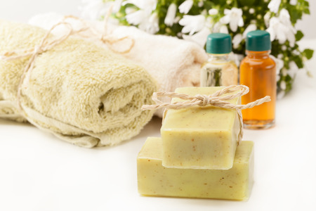 Photo of olive soap and essential oilの写真素材
