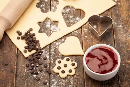 Photo of homemade biscuits over wooden tableの写真素材