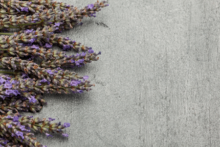 Photo of lavender over wooden tableの写真素材