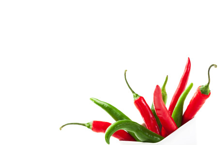 Photo of colorful peppers over white isolated backgroundの写真素材