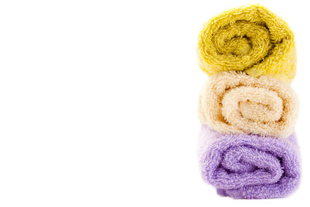 Set of colorful towels over white isolated backgroundの写真素材