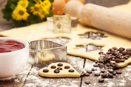Photo of home made biscuits over wooden tableの写真素材