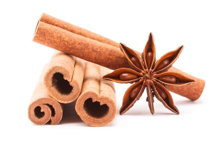 Photo of cinnamon sticks and star anise over white isolated backgroundの写真素材