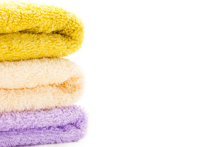 Set of colorful towels over white isolated backgroundの写真素材