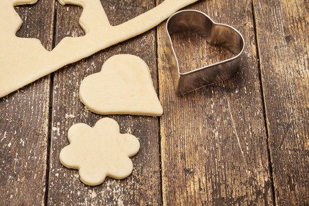 Photo of home made biscuits over wooden tableの写真素材