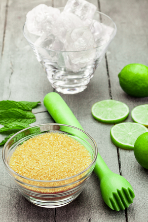 Photo of ingredients for mojito cocktail over wooden tableの写真素材