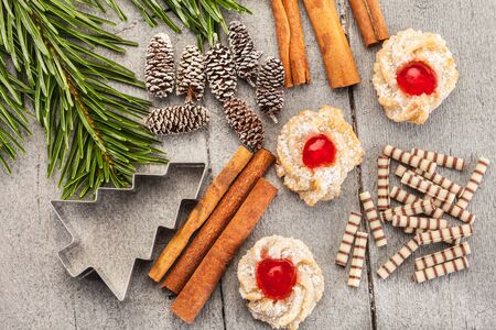 Photo of christmas home made cookies over wooden tableの写真素材
