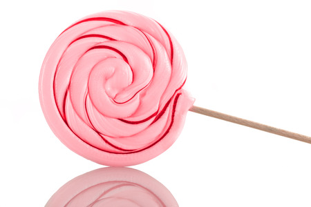 Photo of colorful candies over white isolated backgroundの写真素材
