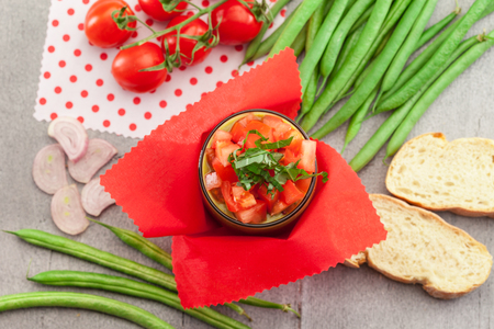Photo of gazpacho over wooden tableの写真素材
