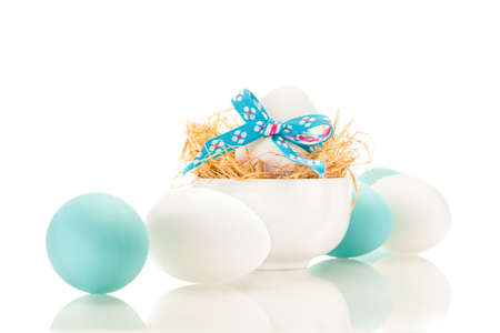 Photo of easter eggs over white isolated backgroundの写真素材