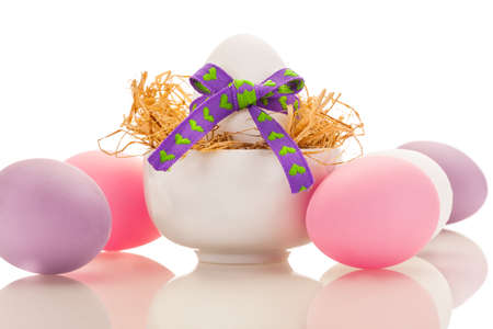 Photo of easter eggs over white isolated backgroundの写真素材