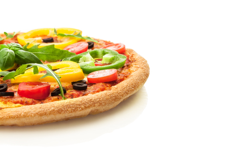 Photo of tasty pizza with paprika over white isolated backgroundの写真素材