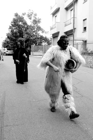 Parade of traditional costumes and masks of Sardinia Jerzu at the Wine Festival in 2014.のeditorial素材