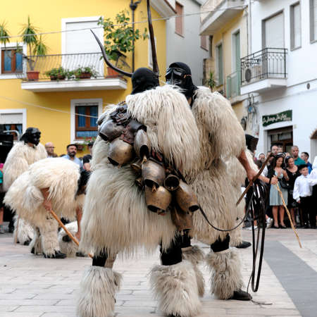 Parade of traditional costumes and masks of Sardinia Jerzu at the Wine Festival in 2014.のeditorial素材