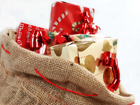 Christmas comes with a sack full of gifts.の写真素材