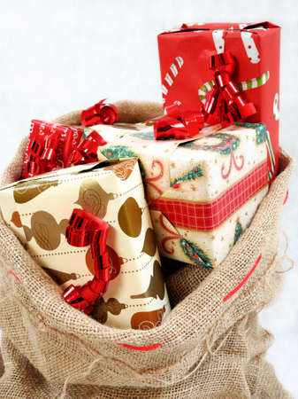 Christmas comes with a sack full of gifts.の写真素材