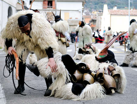 Orani, Sardinia - February 17, 2013: Parade of traditional masks of Sardinia at the Carnival of 17 February 2013 Orani, Sardinia.のeditorial素材
